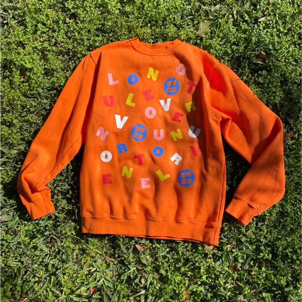Harry Styles love on tour sweatshirt.